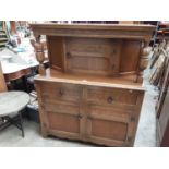 Oak court cupboard with carved decoration