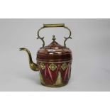 Ornate copper and brass kettle with floral decoration, circa 1900, 37cm height