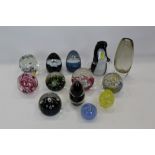 Collection of Art Glass paperweights including Caithness, Wedgwood, Selkirk and Langham