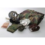 One box of British Army uniform and equipment circa 1970s to include Gas mask, ear defenders and oth