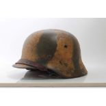 Second World War Nazi M40 pattern SS steel helmet, with camouflage painted finish, single decal part