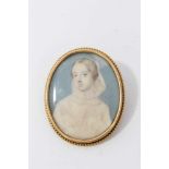 19th century ivory portrait miniature in gilt metal brooch mount