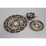 Royal Crown Derby Imari tableware, pattern number 2451, comprising dinner plate, two cups and three
