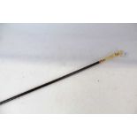 19th Century walking cane with wooden shaft gold plated collar and well carved ivory terminal of a h