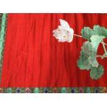 Large Chinese embroidered red silk wall hanging. Polychrome silk thread embroidered lotus flowers, w