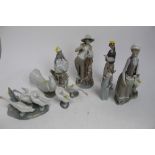 Group of nine Lladro porcelain figures (9)