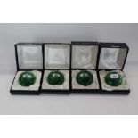 Four Selkirk limited edition glass paperweights by Peter Holmes - Trout, Otter, Frog and Great Crest