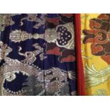 Chinese embroidered silk Dragon wall hanging plus three silk brocade dragon hangings. Also two Tibe