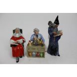 Three Royal Doulton figures - The Wizard HN2877, The China Repairer HN2943 and The Judge HN2443