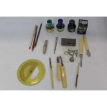 Desk accessories, including four quill cutters / erasers, dip pens, etc