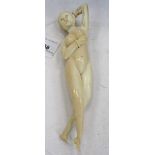 Rare 19th century Chinese carved ivory medical figure, typical reclining female form, 19cm long