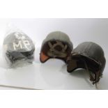 Post War British Military Police motorcycle despatch riders helmet, together with two RAF Aircrew ou