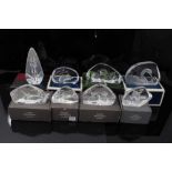 Collection of eight Mats Jonasson Swedish glass intaglio sculptures