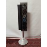 Bang and Olufsen Beosound six disc CD player with floor stand and remote control