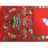 Large Chinese embroidered red silk wall hanging. Polychrome silk thread and metallic embroidered whi