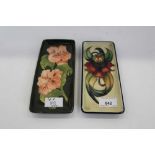 Two Moorcroft pottery pen trays