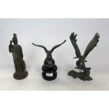 Two spelter figures of eagles, and a brass classical figure (3)