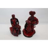 Two Royal Doulton Flambe figures - The Lamp Seller HN3278 The Carpet Seller HN3277