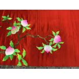 Large Chinese embroidered red silk hanging. Bright polychrome silk thread embroidered woman with de