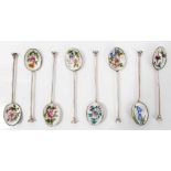 Set eight silver and enamel teaspoons in fitted case