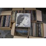 Five boxes of assorted records, plus Jimi Hendrix box set