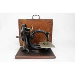 Victorian sewing machine in mahogany case