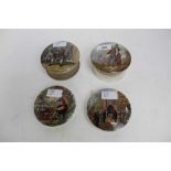 Four Prattware pot lids including Garibaldi and Dr Johnson