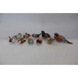 Ten Royal Crown Derby paperweights including Teal Duckling, Crested Tit, Firecrest, William Shakespe