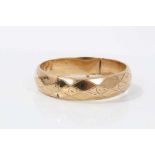 9ct gold hinge bangle with geometric and scroll decoration