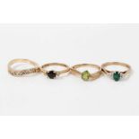 Four 9ct gold multi gem set rings