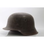 Second World War Nazi M42 Pattern helmet with steel head band and information about the original own