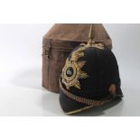 Victorian Lincolnshire Regiment Officers' Blue Cloth helmet with bi metal regimental badge, brass sp