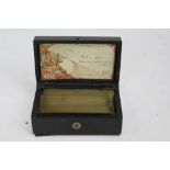 19th century French miniature pressed horn two airs music box, decorated in relief with a scene enti