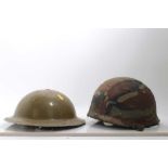 Second World War British Army helmet, in sand coloured camouflage finish, with naming under brim, to