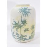 Ruskin pottery canister decorated with blue foliage