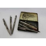 Group of thirteen silver, brass and other propelling pencils