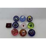 Nine Caithness miniature paperweights by Allan Scott together with a Caithness tiepin (10)