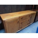 Ercol sideboard with two cupboards and three drawers