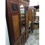 Good quality Edwardian carved walnut bedroom suite comprising double wardrobe with drawers and cupbo