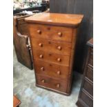 Victorian narrow mahogany chest of five long drawers with bun handles and platform base 53cm wide,95