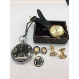 Lorus wristwatch together with a pocket watch, cuff links and badges