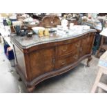 Good quality 1930s walnut sideboard by Jas Shoolbred & Co. with serpentine front , two central drawe