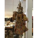 Indonesian puppet with carved wooden head