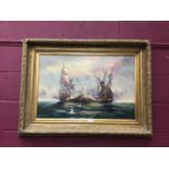 19th Century style oil on canvas depicting man-o-war in battle at sea in gilt frame. 50 cm x 75cm