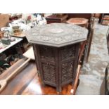 Eastern carved occasional table with octagonal top