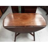 Ercol drop leaf table and an Ercol elbow chair