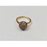 18ct gold and diamond cluster ring with a pavé set bombe diamond cluster
