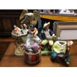 Staffordshire figure groups, tobacco jar and teapot