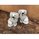 Small pair of Victorian Staffordshire models of poodles