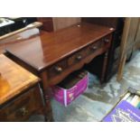 Victorian mahogany side table with three drawers , shaped apron on turned legs 101cm wid